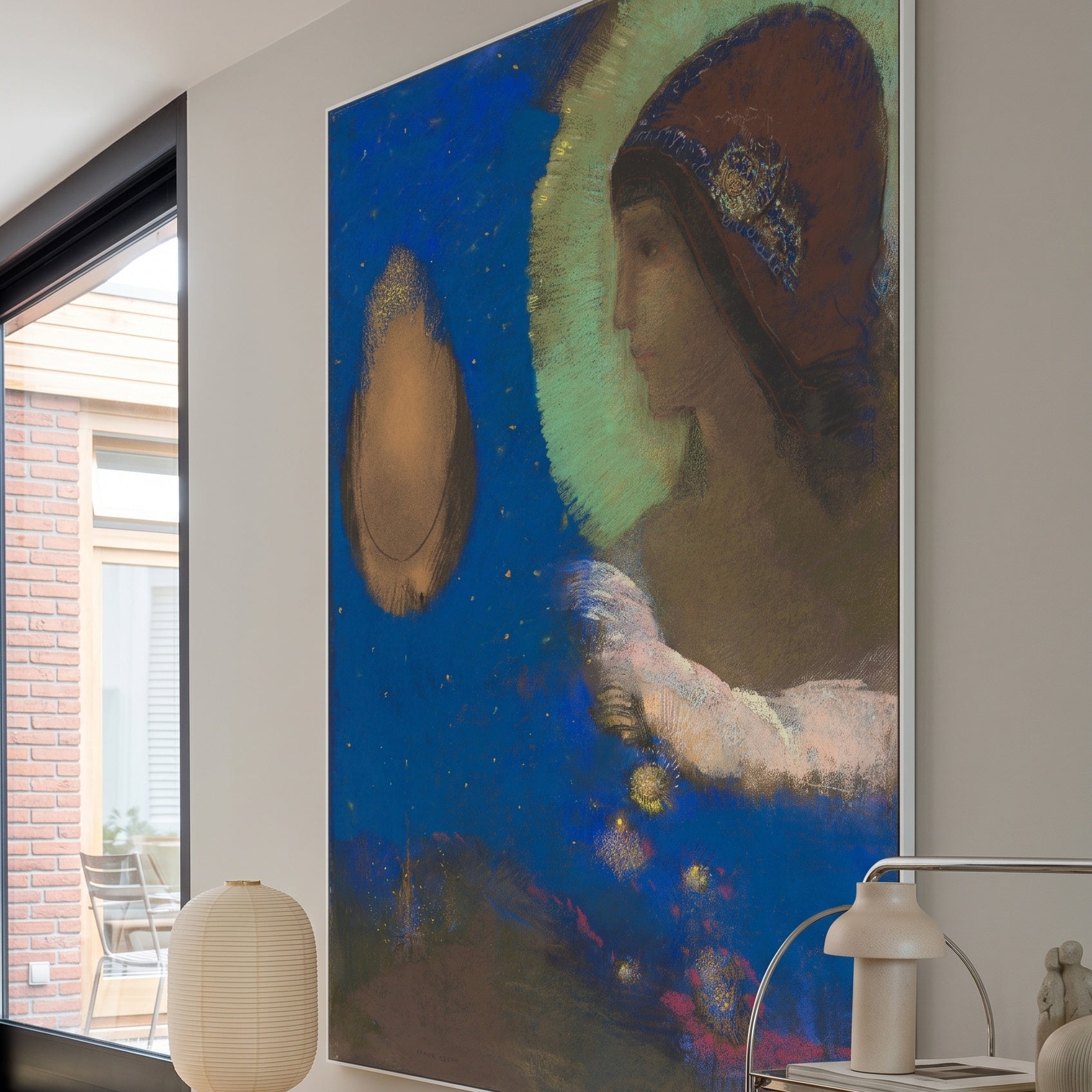 Sita by Odilon Redon — large blue and green Symbolist canvas art on a living room wall
