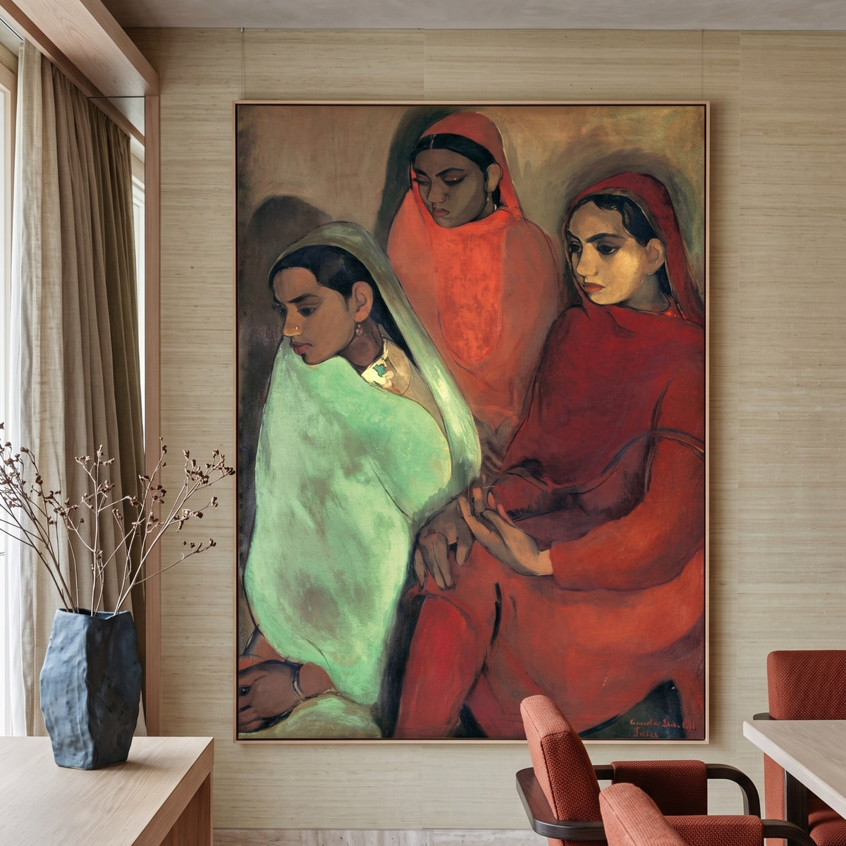 Three Girls by Amrita Sher-Gil — large red and green Portrait canvas art displayed on a wall
